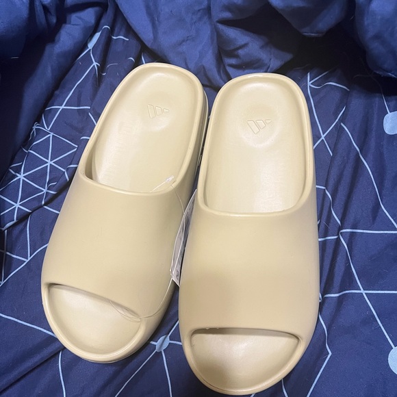 Yeezy slides never worn , have extra pair.  Will ship
